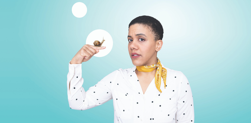 Woman with a snail on her finger.