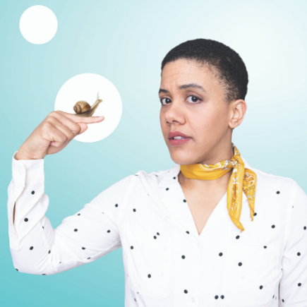 Woman with a snail on her finger.