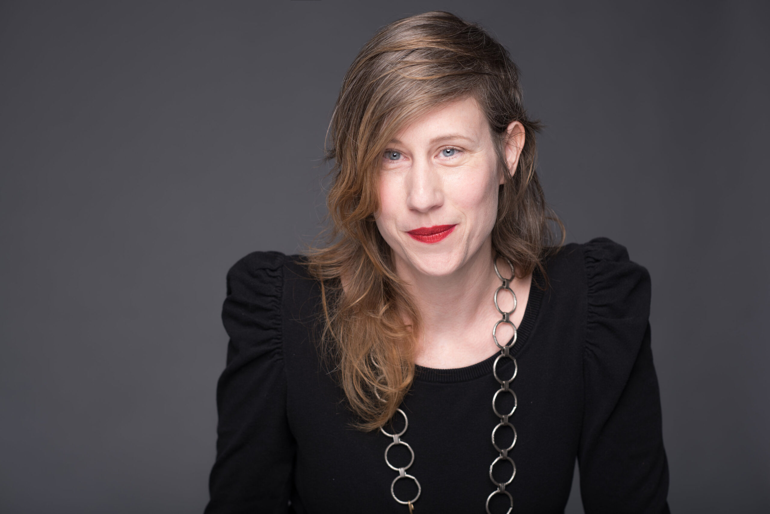 Studio headshot of Andrea Donaldson.